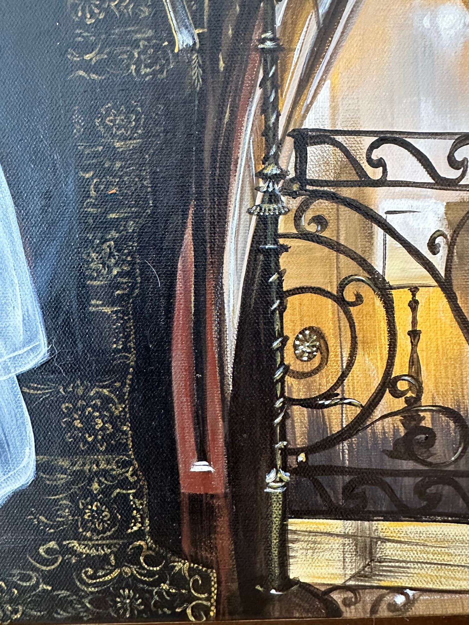 Detail of the gold damask wall pattern and upper section of the wrought-iron stair