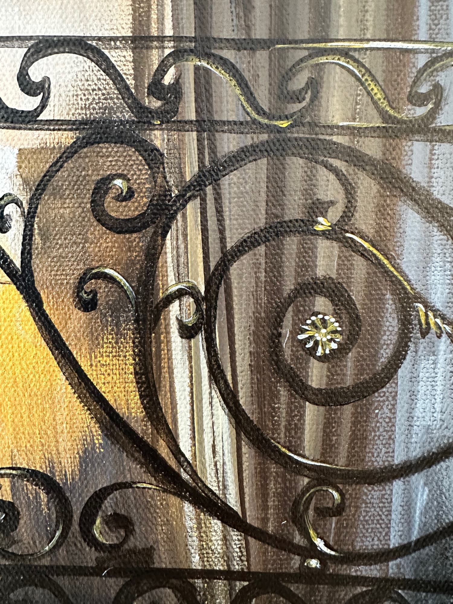 Detail of an ornamental medallion in the wrought iron of the staircase painting