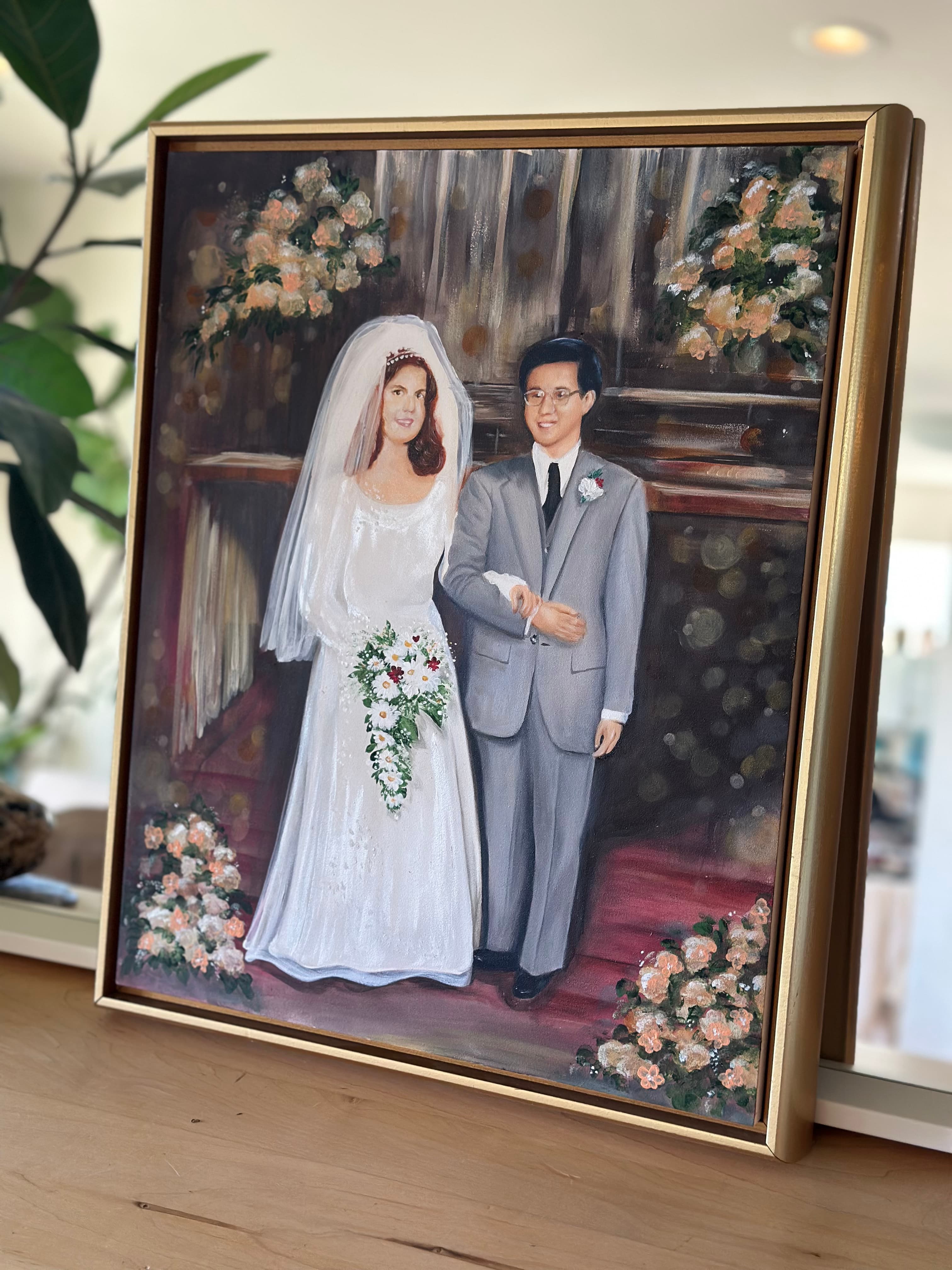 Detail of the couple — her veil and tiara, his glasses and boutonniere, the daisy bouquet