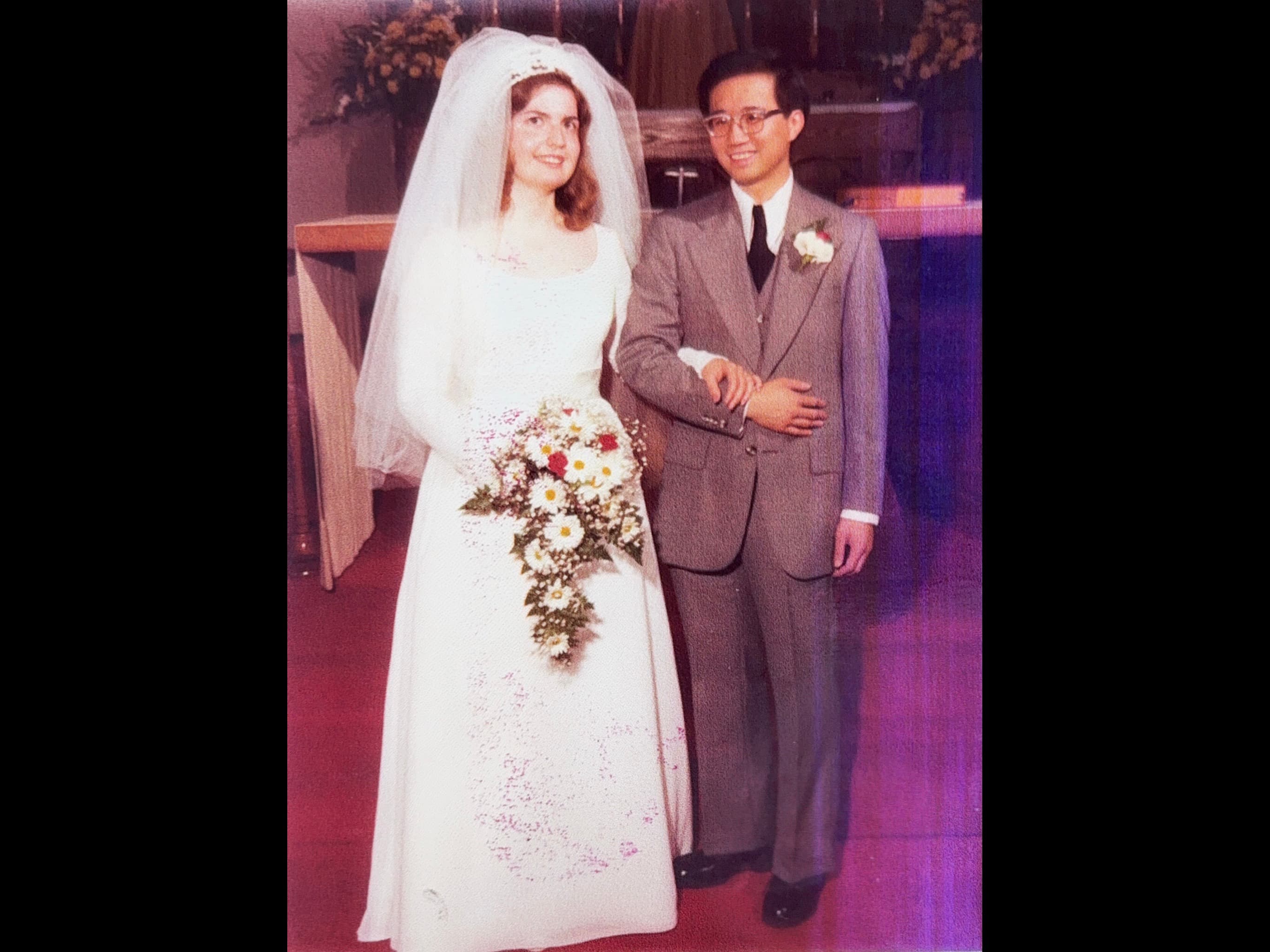 The original wedding photograph from 50 years ago that the painting was created from